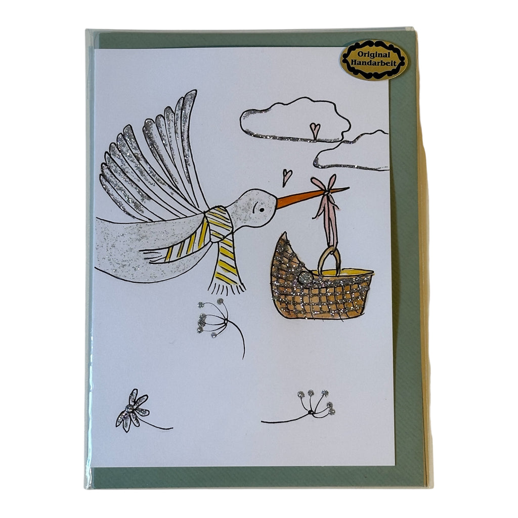 „Der fliegende Storch“ A6-Klappkarte mit Couvert und Glitzerdetails